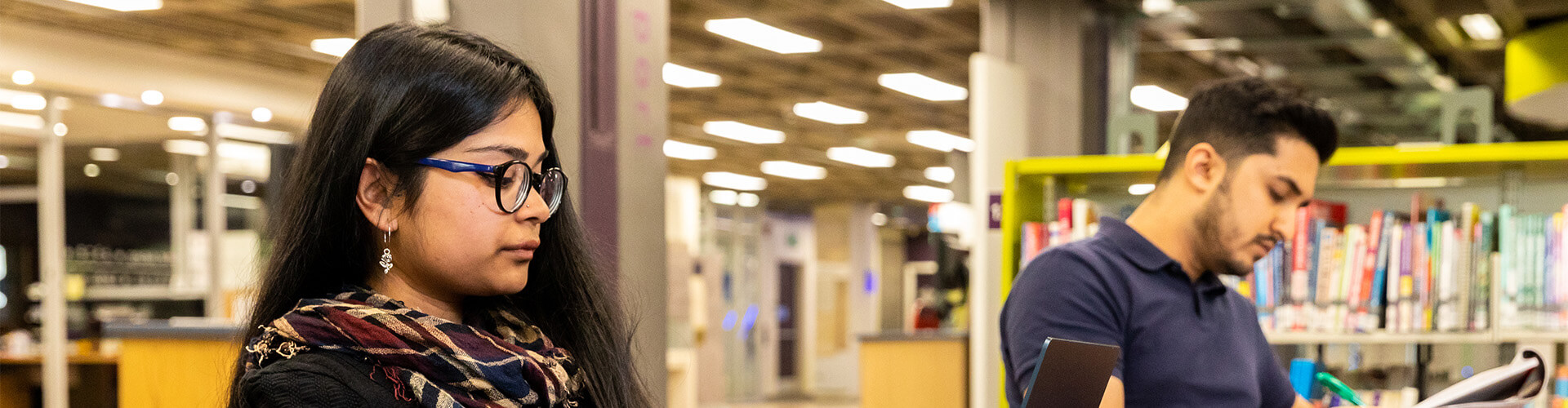 Female and male student studying